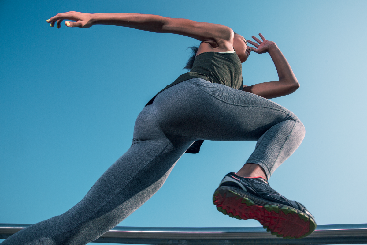 Athlete moving outdoors from a dramatic low angle